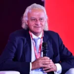 मुफ्त योजनाएं भारत के रुपये को बना रहीं कमजोर: क्रिस्टोफर वुड की रिपोर्ट